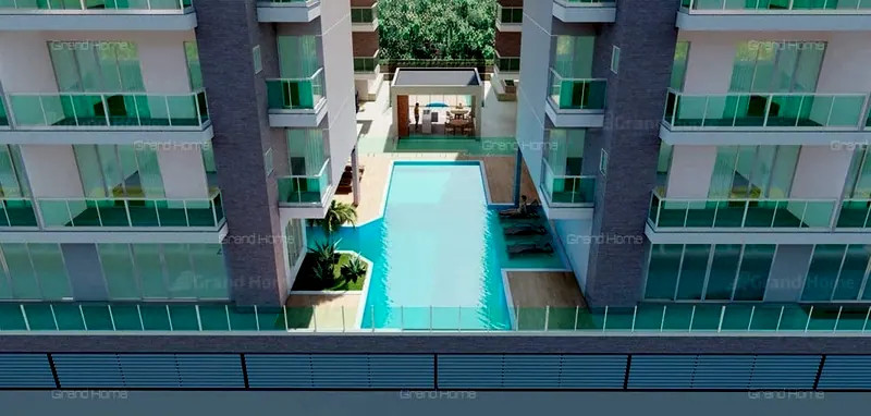 Perspectiva do condomínio com piscina entre as torres