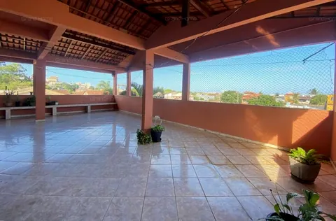 Terraço coberto com vista